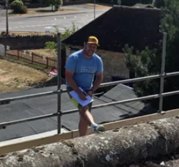 Matthew in action on a roof inspection